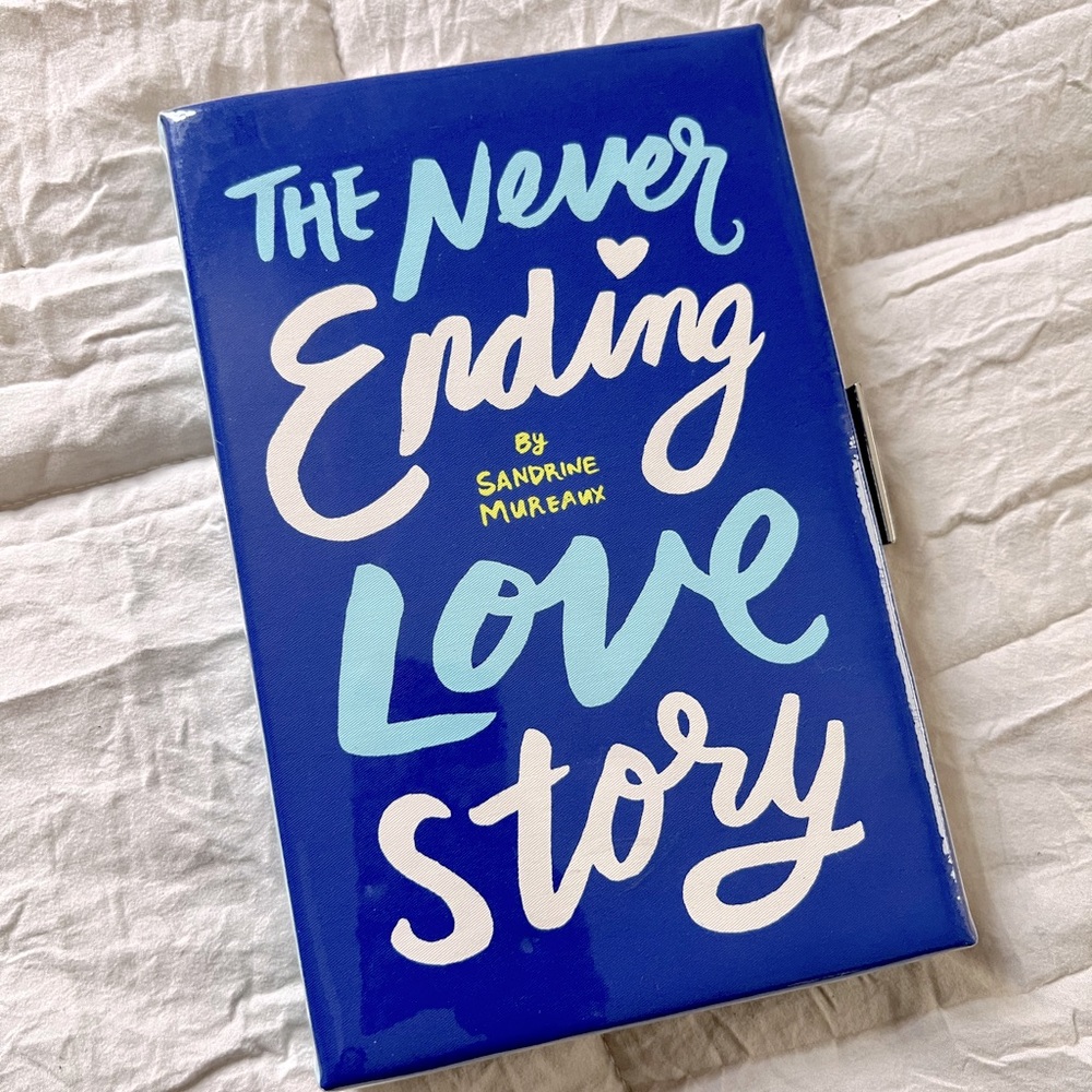 Kate Spade: Never ending love story book clutch (sold out)